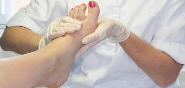 doctor examining a foot